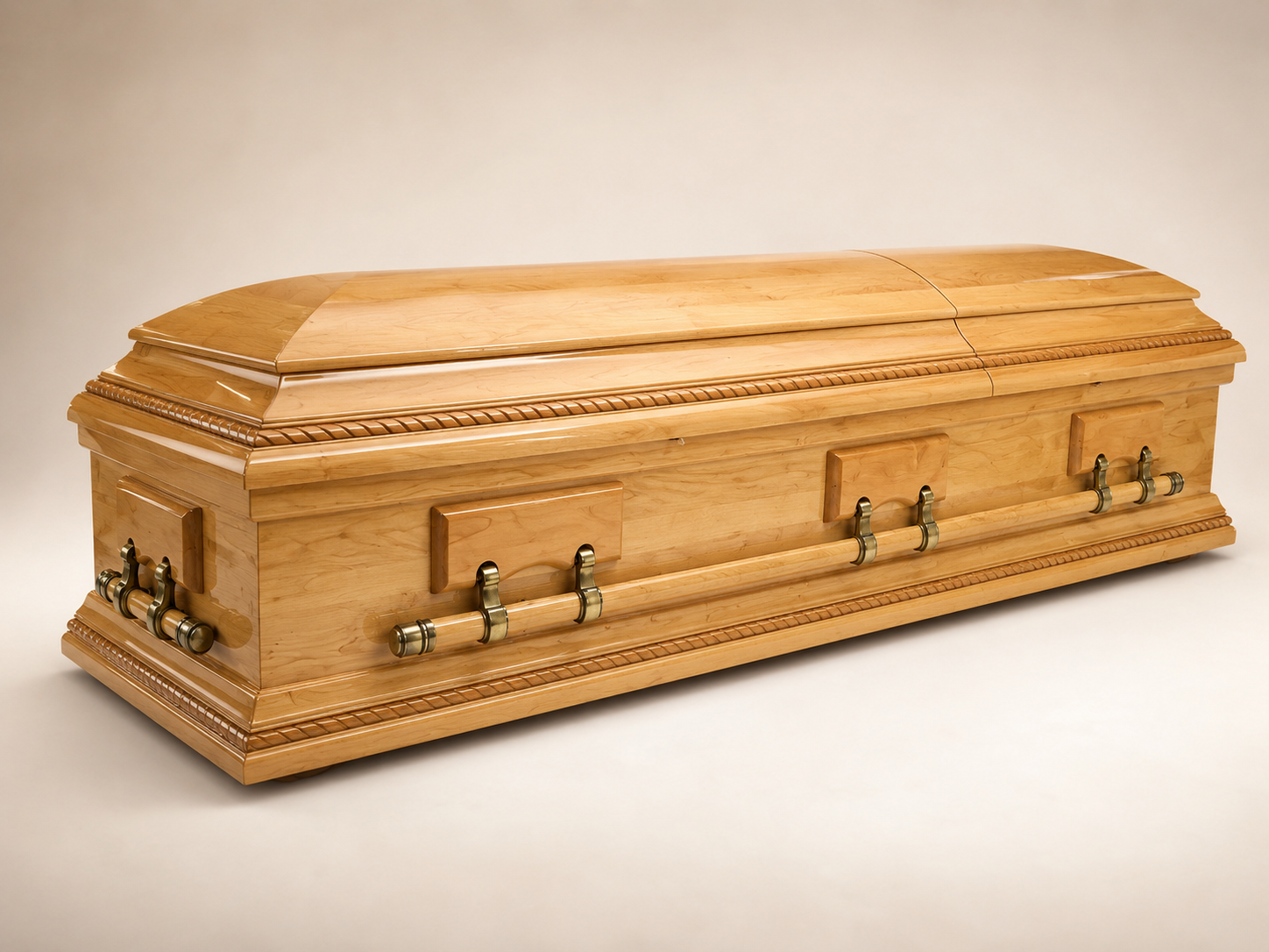 Polished light wood casket